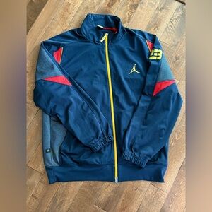 Jordan Men's Performance Jacket in Navy, Red, and Yellow
